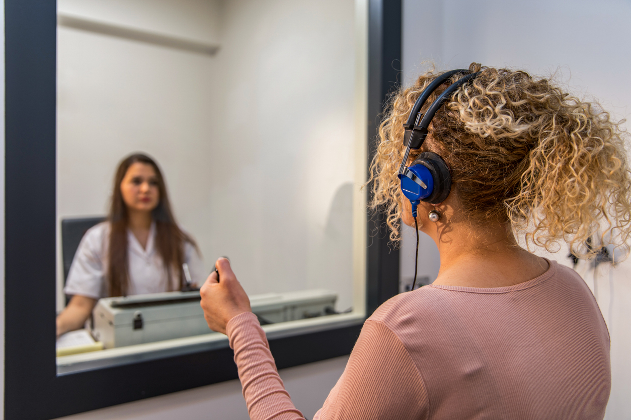 Audiometry exam - Hearing test - Audiologist - Audiometer - Ear test stock